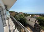 Utjehada havuzlu rahat deniz manzaralı 51 m2 Daire