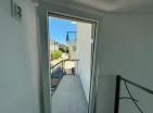 Dobra Vodada deniz manzaralı ve otoparklı modern deniz kenarı 65 m2 daire