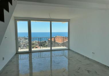 Dobra Vodada deniz manzaralı ve otoparklı modern deniz kenarı 65 m2 daire