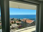 Dobra Vodada deniz manzaralı ve otoparklı modern deniz kenarı 65 m2 daire