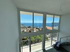 Dobra Vodada deniz manzaralı ve otoparklı modern deniz kenarı 65 m2 daire