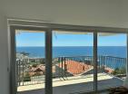 Dobra Vodada deniz manzaralı ve otoparklı modern deniz kenarı 65 m2 daire